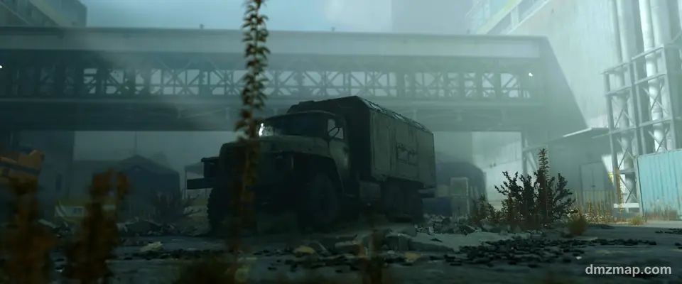An old military truck under a covered walkway between industrial buildings in Hajin, a cooling tower in the mist behind, MW4 DMZ