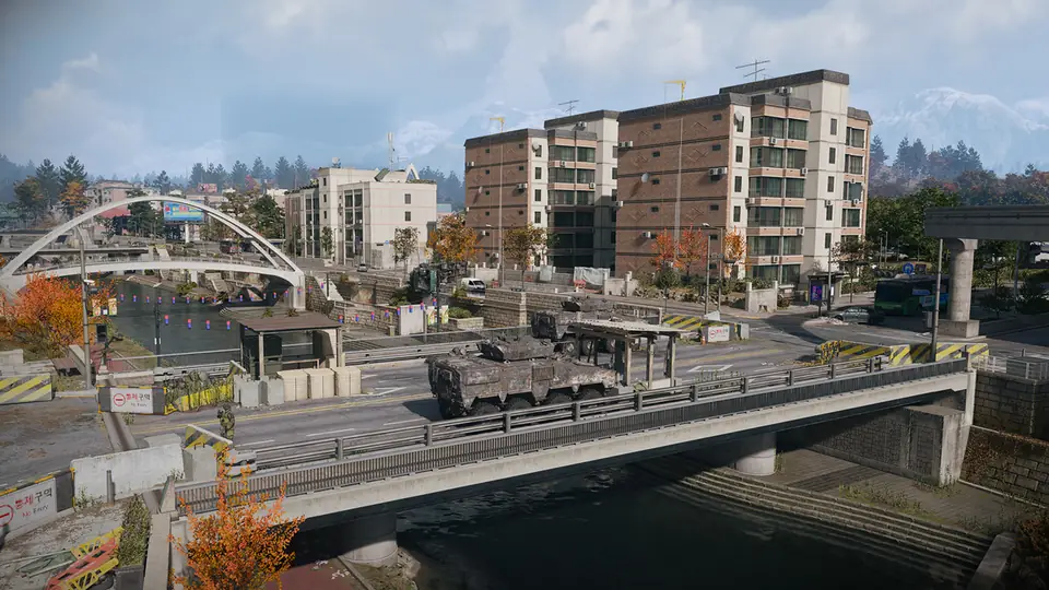 Hajin River Heights in MW4 DMZ: apartment blocks, a white arch bridge and an armored vehicle