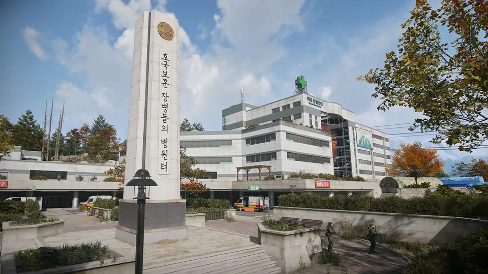 Mirae General Hospital in MW4 DMZ with a tall stone memorial obelisk in front