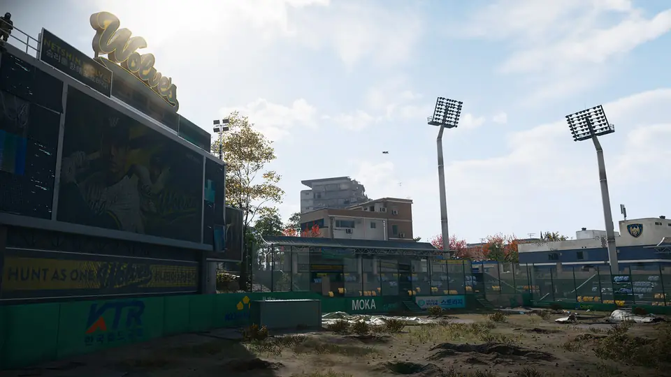 The ruined baseball field and floodlights of Wolves Stadium in MW4 DMZ