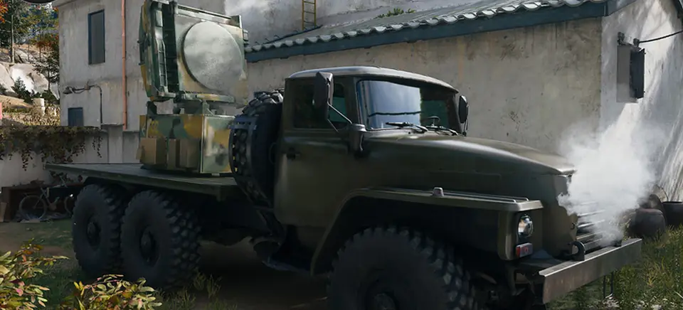 The D50 Radar Flatbed in MW4 DMZ: an olive six-wheeled truck carrying a camouflaged radar unit